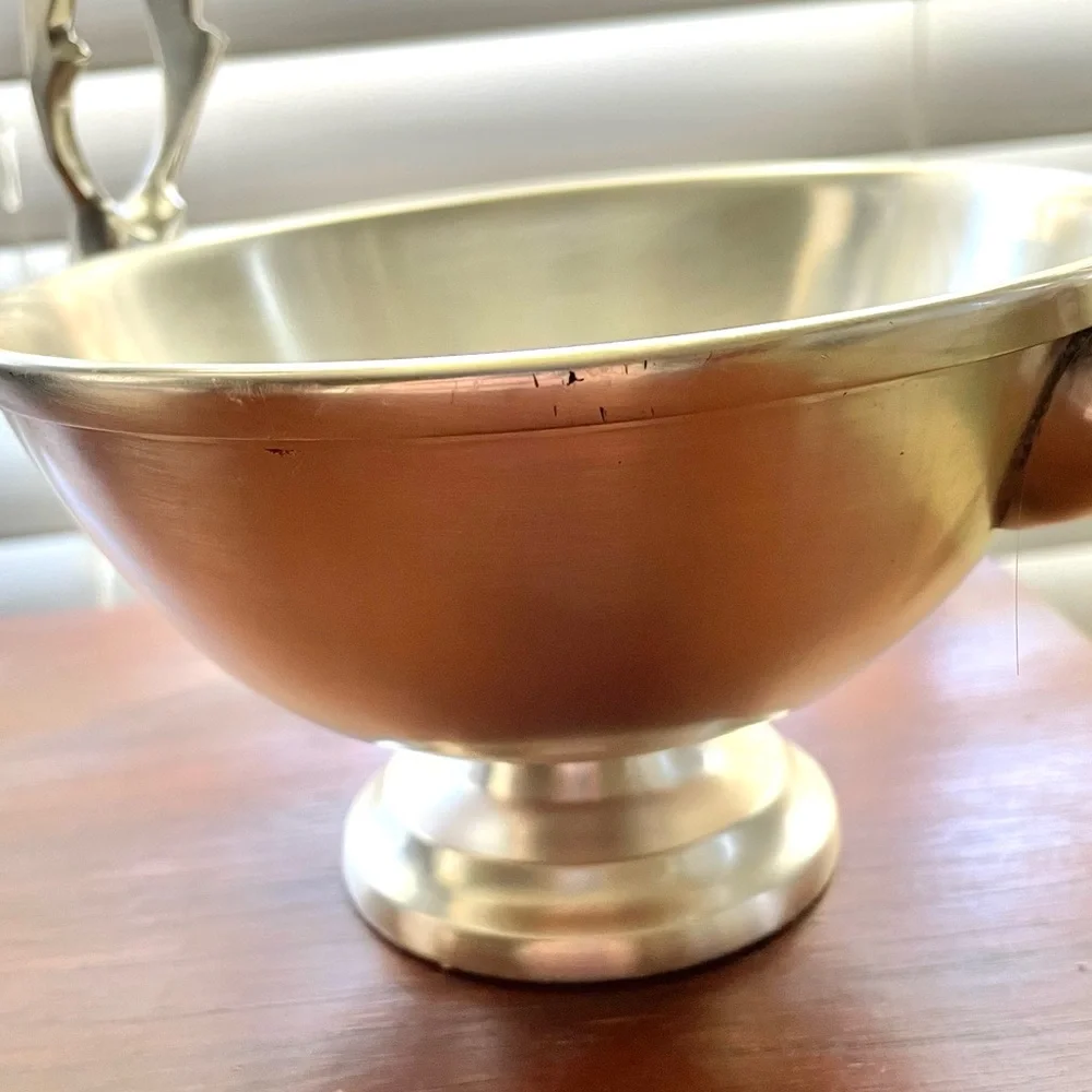 Pair of Crate&Barrel modern reindeer holiday stainless steel footed bowls, 6”